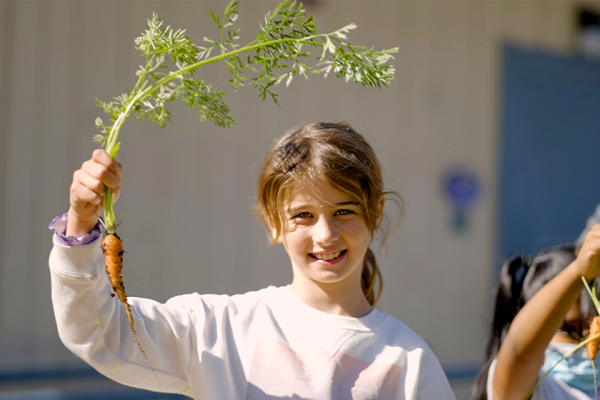 student with carrot