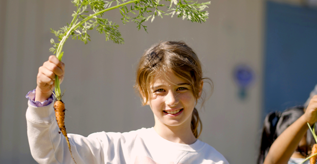 student with carrot